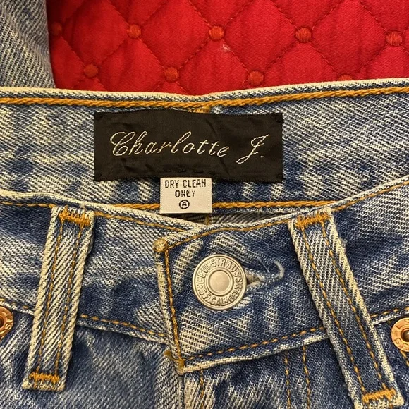 Vintage Levi’s redesign by Charlotte f with real feather detail o de legs sides